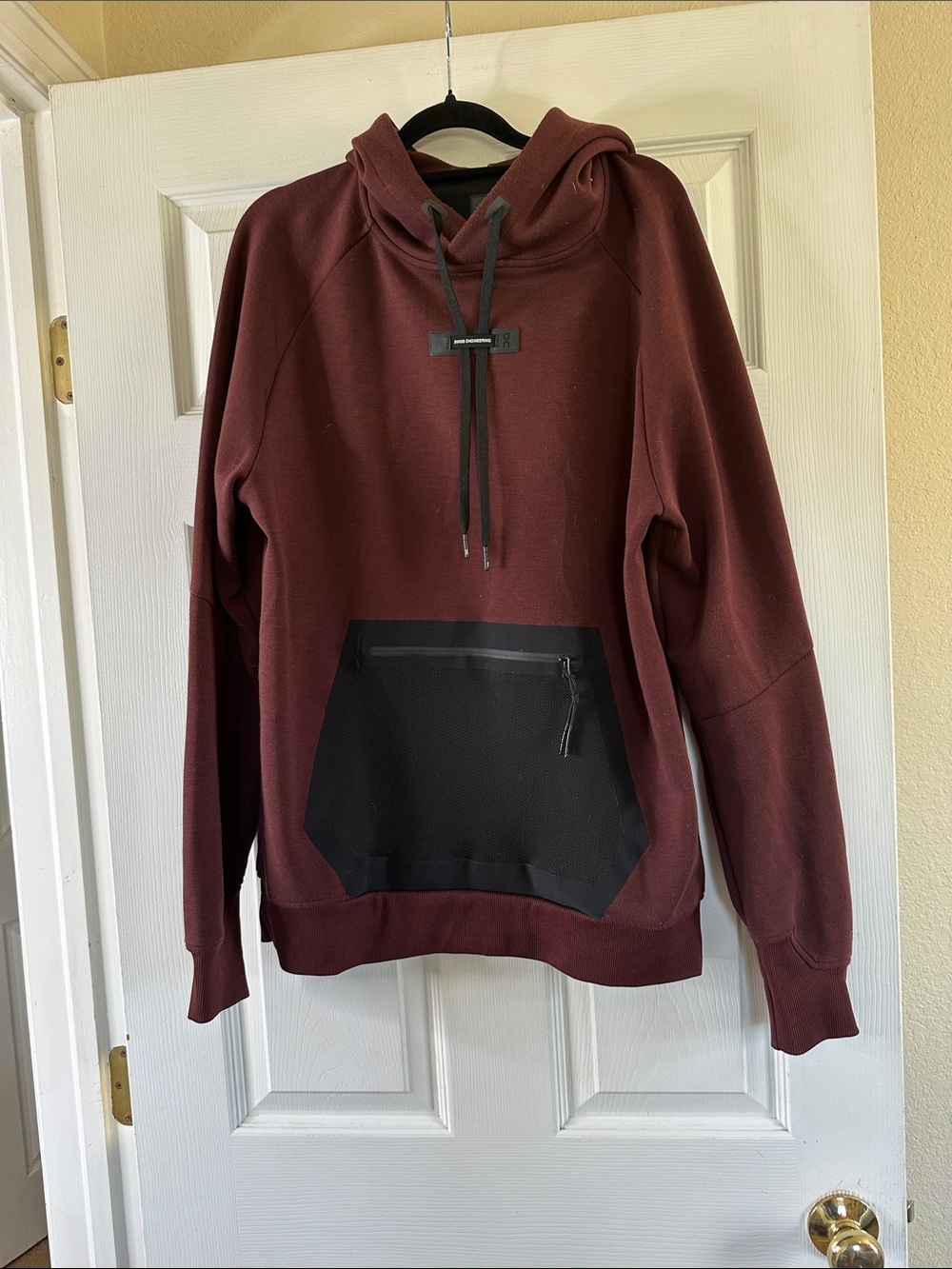 On Running Maroon Hoodie with Black Zip Pocket